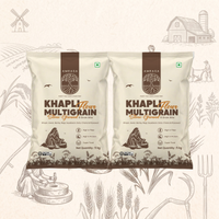 Two bags of Khapli Multigrain Flour with a rustic background featuring farm elements.