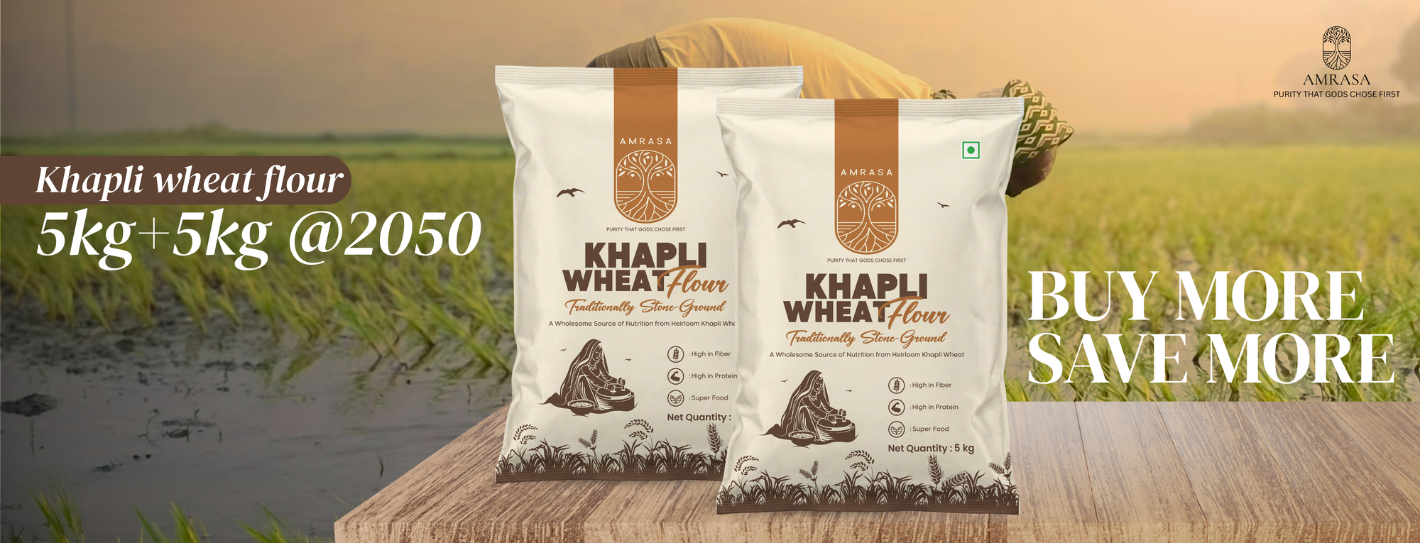 Two bags of Khapli wheat flour with a scenic background